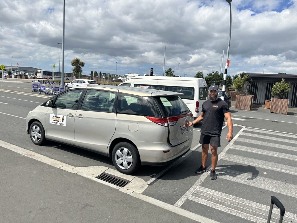 Kiwi Car Hire shuttle waiting for you at Auckland Airport